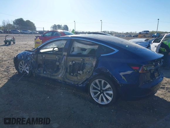 2019 Tesla Model 3 Long Range with VIN 5YJ3E1EB7KF454636, listed as a IAAI auction lot 41853972 with 56,916 mi miles. Bid and sale history available at carsss.com. Image 3.