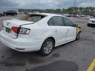 2015 Volkswagen Jetta Sedan 1.8T SE w/Connectivity with VIN 3VWD07AJ8FM261767, listed as a IAAI auction lot 41840088 with 23,289 mi miles. Bid and sale history available at carsss.com. Image 4.