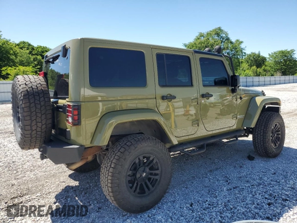 2013 Jeep Wrangler Unlimited Rubicon with VIN 1C4BJWFG0DL587057, listed as a Copart auction lot 57362535 with 102,684 mi miles and Salvage title. Bid and sale history available at DreamBid. Image 3.