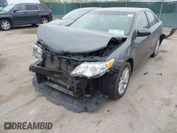 2014 Toyota Camry L with VIN 4T4BF1FK6ER364253, listed as a IAAI auction lot 42011773 with 87,051 mi miles. Bid and sale history available at carsss.com. Image 6.