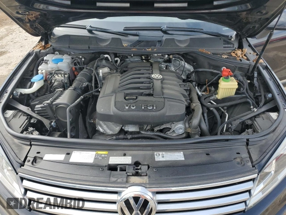 2016 Volkswagen Touareg Sport z VIN WVGEF9BP3GD008823, wystawiony jako Copart lot #56838985 z przebiegiem 49 612 mil mil oraz Nie do naprawy • Non repairable. Historia ofert i sprzedaży dostępna na DreamBid. Obrazek 12.