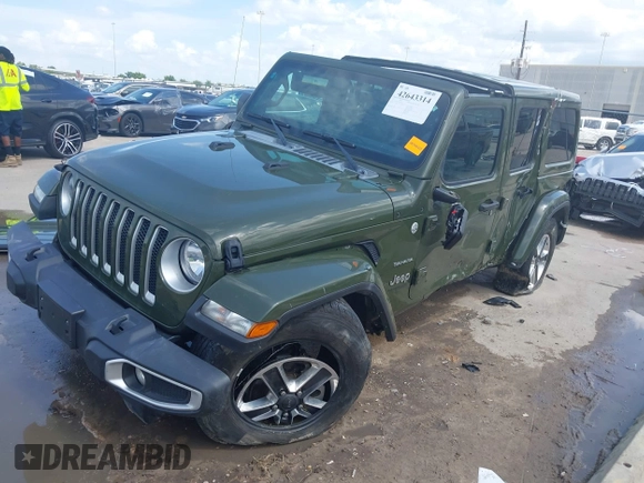 2022 Jeep Wrangler Unlimited Sahara Altitude with VIN 1C4HJXEG3NW194042, listed as a IAAI auction lot 42643314 with 32,091 mi miles and . Bid and sale history available at DreamBid. Image 2.