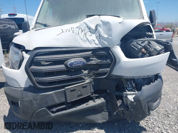 2020 Ford Transit Cargo z VIN 1FTBR1X84LKB78275, wystawiony jako IAAI lot #41825509 z przebiegiem 78 826 mil mil oraz . Historia ofert i sprzedaży dostępna na DreamBid. Obrazek 6.