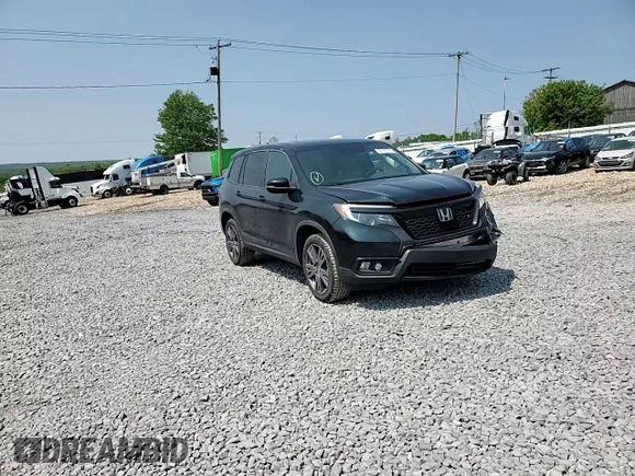2020 Honda Passport EX-L with VIN 5FNYF8H57LB011549, listed as a Copart auction lot 59123735 with 127,797 mi miles and Salvage title. Bid and sale history available at DreamBid. Image 14.