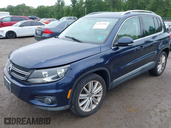 2012 Volkswagen Tiguan SE with VIN WVGBV7AX7CW552641, listed as a IAAI auction lot 42547566 with 184,617 mi miles and . Bid and sale history available at DreamBid. Image 2.