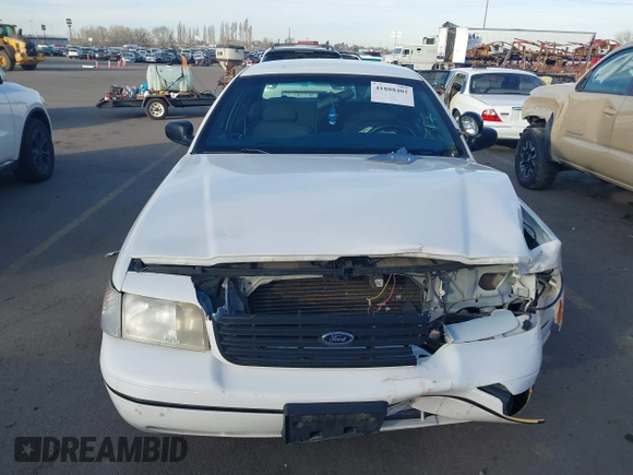 2000 Ford Crown Victoria Police Interceptor z VIN 2FAFP71W9YX149303, wystawiony jako IAAI lot #41888402 z przebiegiem 148 081 mil mil oraz . Historia ofert i sprzedaży dostępna na DreamBid. Obrazek 12.