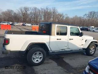 2023 Jeep Gladiator Sport S z VIN 1C6HJTAG7PL535209, wystawiony jako IAAI lot #41483780 z przebiegiem 39 376 mil mil oraz . Historia ofert i sprzedaży dostępna na DreamBid. Obrazek 13.