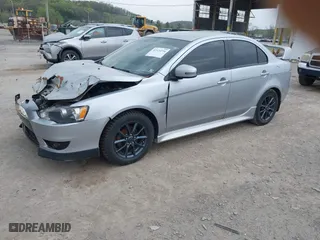 2015 Mitsubishi Lancer ES with VIN JA32U2FU4FU008377, listed as a IAAI auction lot 42124216 with 204,447 mi miles. Bid and sale history available at carsss.com. Image 2.