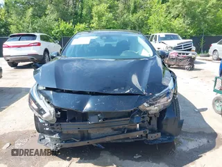 2024 Nissan Versa SR z VIN 3N1CN8FV7RL916970, wystawiony jako IAAI lot #42451275 z przebiegiem 22 324 mil mil oraz . Historia ofert i sprzedaży dostępna na DreamBid. Obrazek 6.