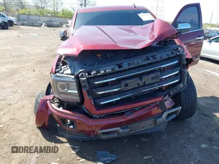 2014 GMC Sierra 1500 SLT with VIN 3GTU2VECXEG485827, listed as a IAAI auction lot 41976816 with 157,200 mi miles and . Bid and sale history available at DreamBid. Image 6.