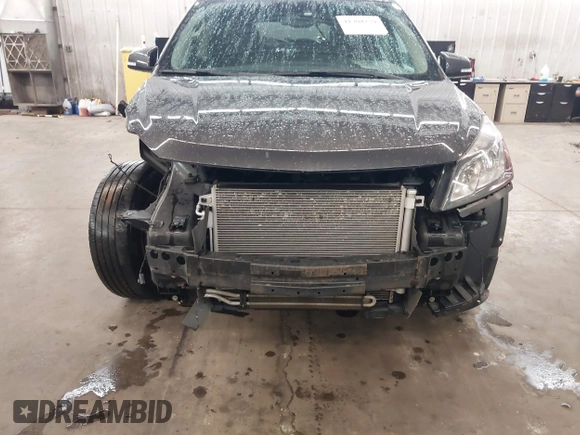 2015 Chevrolet Traverse LT with VIN 1GNKVHKD5FJ192552, listed as a IAAI auction lot 41708239 with 185,664 mi miles and . Bid and sale history available at DreamBid. Image 6.