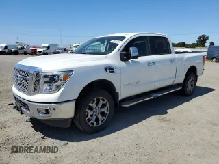 2017 Nissan Titan Pro-4X z VIN 1N6BA1F40HN559615, wystawiony jako Copart lot #57636455 z przebiegiem 99 803 mil mil oraz Szkody całkowita. Historia ofert i sprzedaży dostępna na DreamBid. Obrazek 1.