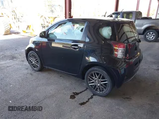 2012 Scion iQ with VIN JTNJJXB00CJ016247, listed as a IAAI auction lot 42117563 with 105,809 mi miles. Bid and sale history available at carsss.com. Image 3.