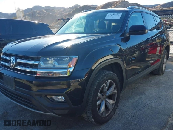 2019 Volkswagen Atlas SE with VIN 1V2LR2CAXKC566024, listed as a IAAI auction lot 41296531 with 106,175 mi miles and . Bid and sale history available at DreamBid. Image 2.