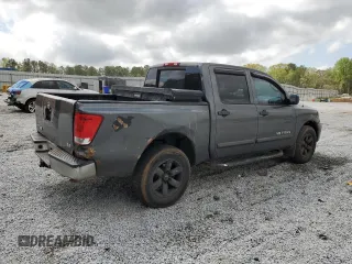 2010 Nissan Titan XE with VIN 1N6BA0EJ1AN312188, listed as a Copart auction lot 50984505 with 391,186 mi miles and Salvage Title. Bid and sale history available at carsss.com. Image 3.