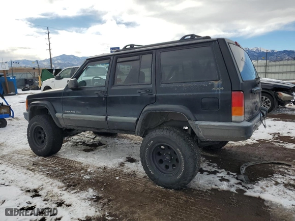 2000 Jeep Cherokee Police with VIN 1J4FF48S9YL205293, listed as a Copart auction lot 41903715 with 307,918 mi miles and Salvage Title. Bid and sale history available at carsss.com. Image 2.