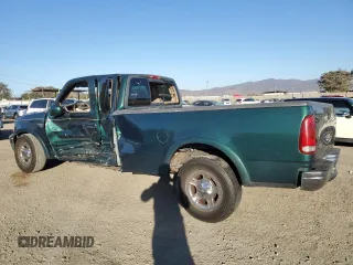 2000 Ford F-150 XL with VIN 1FTRX17W4YNB17453, listed as a Copart auction lot 52051215 with Not provided miles and Salvage title. Bid and sale history available at DreamBid. Image 2.