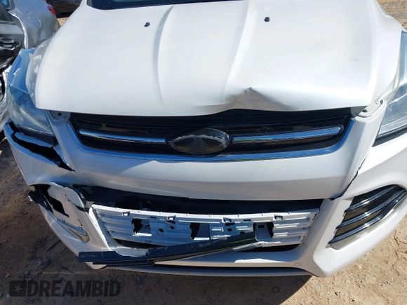 2013 Ford Escape SEL with VIN 1FMCU0HX0DUC07372, listed as a IAAI auction lot 41740884 with 96,436 mi miles and . Bid and sale history available at DreamBid. Image 6.
