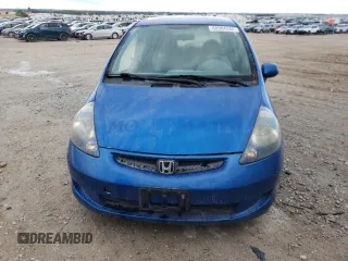2007 Honda Fit with VIN JHMGD38437S043630, listed as a Copart auction lot 68904544 with 127,279 mi miles and Salvage Title. Bid and sale history available at carsss.com. Image 5.