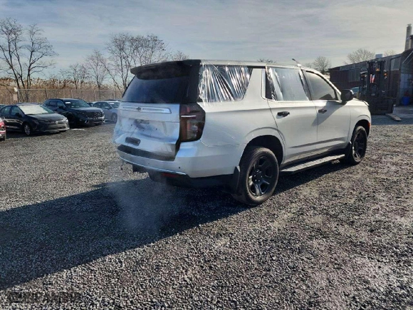 2023 Chevrolet Tahoe Commercial with VIN 1GNSKLED0PR500995, listed as a Copart auction lot 87460084 with 19,698 mi miles and Salvage Title. Bid and sale history available at carsss.com. Image 4.