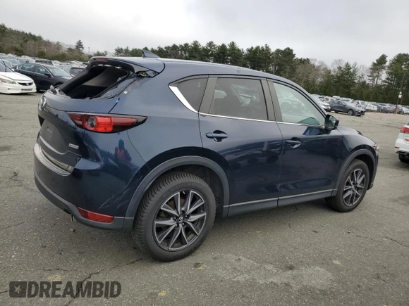 2018 Mazda CX-5 Touring with VIN JM3KFBCM9J0433729, listed as a Copart auction lot 49945515 with 143,064 mi miles and Salvage Title. Bid and sale history available at carsss.com. Image 3.