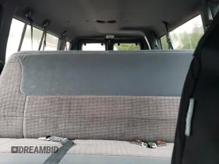 1994 Ford Econoline Wagon XL z VIN 1FBJS31H1RHB32773, wystawiony jako Copart lot #82008864 z przebiegiem Nie podano mil oraz Tytuł czysty. Historia ofert i sprzedaży dostępna na DreamBid. Obrazek 10.