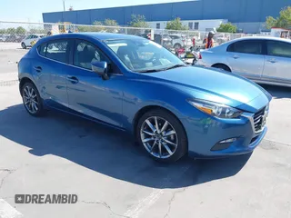 2018 Mazda 3 Touring z VIN 3MZBN1L37JM248151, wystawiony jako IAAI lot #42338417 z przebiegiem 65 007 mil mil oraz . Historia ofert i sprzedaży dostępna na DreamBid. Obrazek 1.
