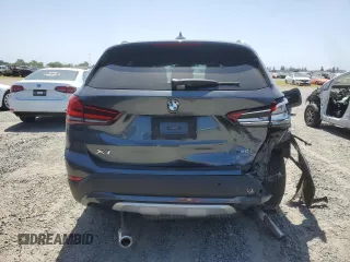 2020 BMW X1 xDrive28i с VIN WBXJG9C06L5R54942, выставлен на аукционе Copart как лот 54262435 с пробегом 65 217 миль миль и Списание • Salvage title. История ставок и продаж доступна на DreamBid. Изображение 6.
