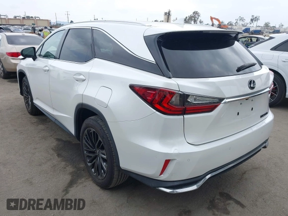 2022 Lexus RX 350L with VIN JTJHZKEA4N2023876, listed as a IAAI auction lot 42116084 with 8,841 mi miles and . Bid and sale history available at DreamBid. Image 3.