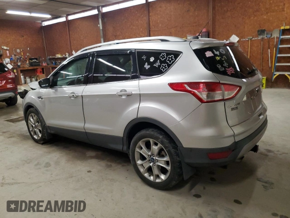 2014 Ford Escape Titanium с VIN 1FMCU0J94EUD41993, выставлен на аукционе Copart как лот 56933605 с пробегом 104 011 миль миль и Списание • Salvage title. История ставок и продаж доступна на DreamBid. Изображение 2.