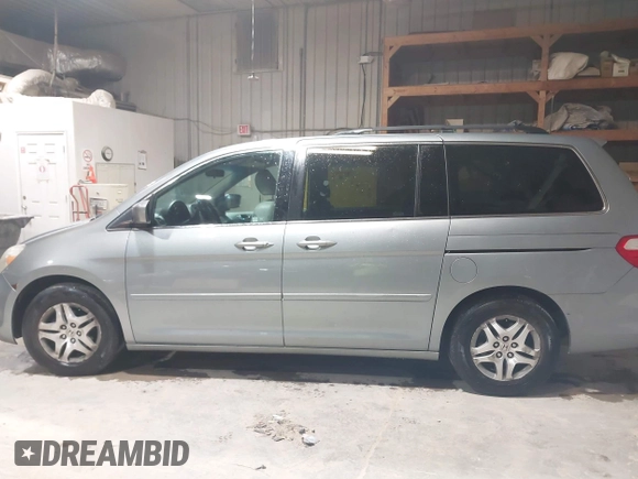 2007 Honda Odyssey EX-L with VIN 5FNRL38697B012944, listed as a IAAI auction lot 42144250 with 234,016 mi miles and . Bid and sale history available at DreamBid. Image 14.
