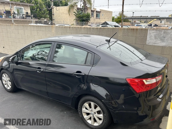 2013 Kia Rio EX with VIN KNADN4A3XD6150037, listed as a IAAI auction lot 42487891 with 150,999 mi miles and . Bid and sale history available at DreamBid. Image 3.