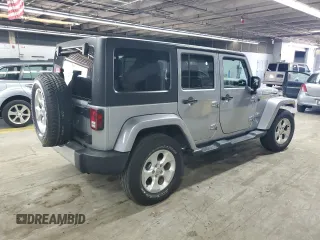 2015 Jeep Wrangler Unlimited Sahara with VIN 1C4BJWEG5FL743663, listed as a Copart auction lot 60205225 with 69,922 mi miles and Salvage title. Bid and sale history available at DreamBid. Image 3.