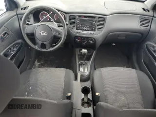 2010 Kia Rio with VIN KNADH4B33A6617736, listed as a Copart auction lot 45469215 with 233,539 mi miles and Clean Title. Bid and sale history available at DreamBid. Image 8.