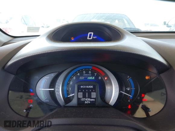 2010 Honda Insight LX with VIN JHMZE2H54AS021815, listed as a IAAI auction lot 42259951 with 137,436 mi miles and . Bid and sale history available at DreamBid. Image 7.