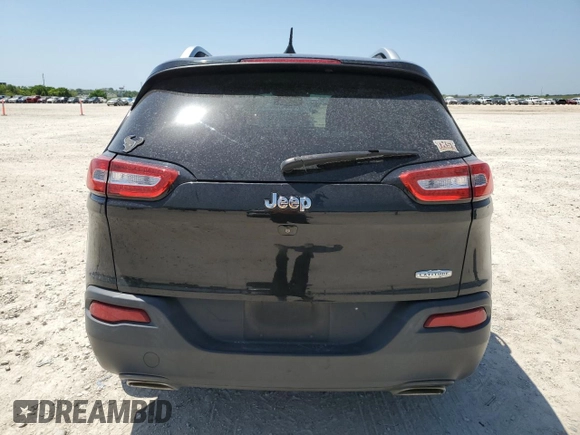 2016 Jeep Cherokee Altitude with VIN 1C4PJLCS0GW171848, listed as a Copart auction lot 52943535 with 141,686 mi miles and Clean Title. Bid and sale history available at carsss.com. Image 6.