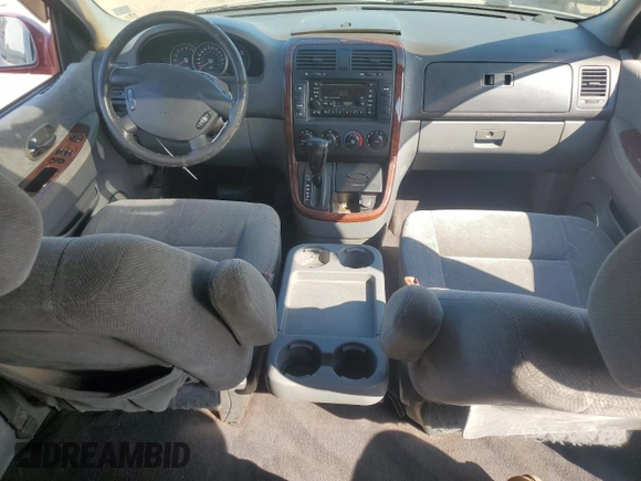 2003 Kia Sedona LX with VIN KNDUP131236411909, listed as a Copart auction lot 73715384 with 179,642 mi miles and Salvage Title. Bid and sale history available at carsss.com. Image 8.
