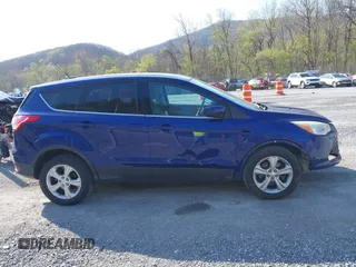 2013 Ford Escape SE with VIN 1FMCU9G94DUC21850, listed as a IAAI auction lot 42003396 with 182,663 mi miles. Bid and sale history available at carsss.com. Image 13.