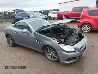 2014 Mercedes-Benz SLK 250 with VIN WDDPK4HA6EF084283, listed as a IAAI auction lot 41927893 with 32,143 mi miles and . Bid and sale history available at DreamBid. Image 1.
