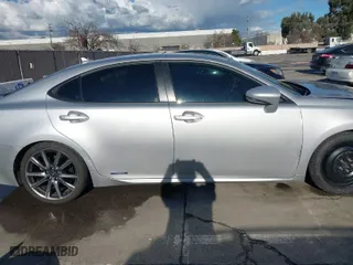 2014 Lexus ES 300h Hybrid with VIN JTHBW1GG6E2054347, listed as a IAAI auction lot 41546704 with 225,040 mi miles. Bid and sale history available at carsss.com. Image 14.