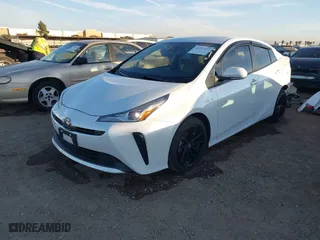 2021 Toyota Prius L Eco with VIN JTDKAMFU8M3132998, listed as a IAAI auction lot 41227212 with 64,681 mi miles. Bid and sale history available at carsss.com. Image 18.