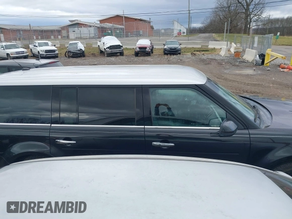 2013 Ford Flex Limited w/EcoBoost with VIN 2FMHK6DT1DBD09027, listed as a IAAI auction lot 41727762 with 139,394 mi miles. Bid and sale history available at carsss.com. Image 13.