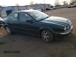 2004 Jaguar X-Type z VIN SAJEA51C04WD65097, wystawiony jako Copart lot #53825295 z przebiegiem 58 270 mil mil oraz Szkoda całkowita • Salvage title. Historia ofert i sprzedaży dostępna na DreamBid. Obrazek 4.