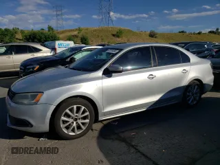 2012 Volkswagen Jetta SE with VIN 3VWDX7AJ4CM077031, listed as a Copart auction lot 67516484 with 201,024 mi miles and Salvage title. Bid and sale history available at DreamBid. Image 1.