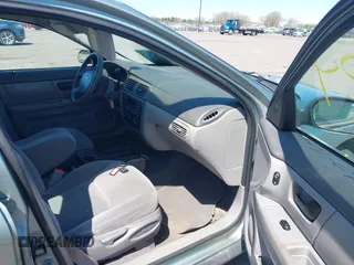 2005 Ford Taurus SE with VIN 1FAFP53U05A273576, listed as a IAAI auction lot 42140404 with 58,735 mi miles. Bid and sale history available at carsss.com. Image 5.