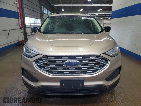 2020 Ford Edge SE с VIN 2FMPK4G94LBA07908, выставлен на аукционе Copart как лот 59572605 с пробегом 110 989 миль миль и Списание • Salvage title. История ставок и продаж доступна на DreamBid. Изображение 5.