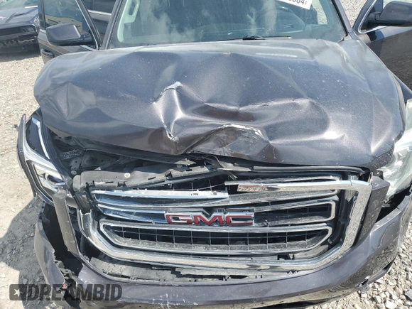 2015 GMC Yukon SLT z VIN 1GKS1BKC4FR274240, wystawiony jako Copart lot #72913884 z przebiegiem 132 096 mil mil oraz Szkoda całkowita • Salvage title. Historia ofert i sprzedaży dostępna na DreamBid. Obrazek 13.