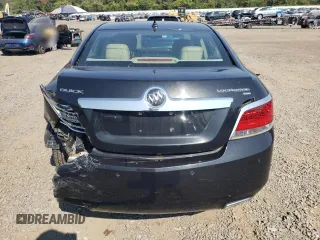 2013 Buick LaCrosse Premium 1 с VIN 1G4GG5E39DF189059, выставлен на аукционе Copart как лот 71013444 с пробегом 125 846 миль миль и Списание • Salvage title. История ставок и продаж доступна на DreamBid. Изображение 6.