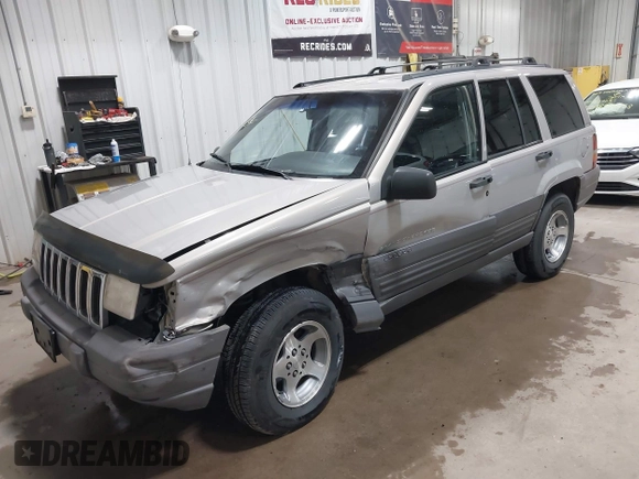 1996 Jeep Grand Cherokee Laredo z VIN 1J4GZ58S5TC293897, wystawiony jako IAAI lot #42435233 z przebiegiem 167 432 mil mil oraz . Historia ofert i sprzedaży dostępna na DreamBid. Obrazek 17.