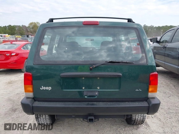 1999 Jeep Cherokee Sport with VIN 1J4FF68S1XL555463, listed as a IAAI auction lot 41898076 with 206,656 mi miles. Bid and sale history available at carsss.com. Image 16.